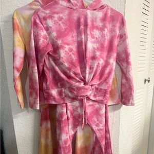 Two sets of girls size 10 long sleeve and pants. The dye colors.